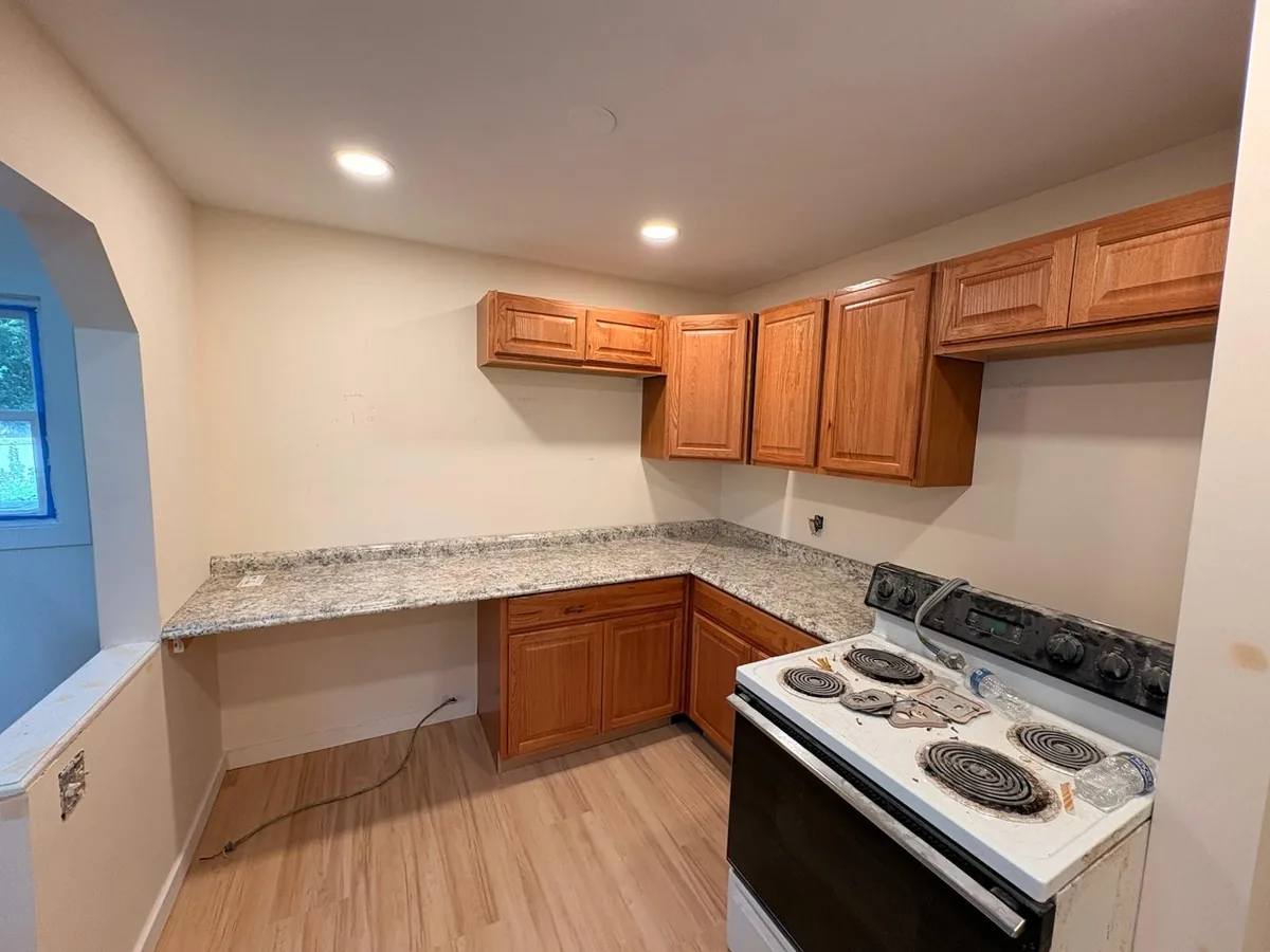Renovated kitchen with new cabinets and countertop